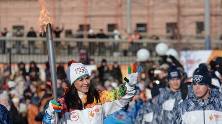 Во время эстафеты Олимпийского огня в Астрахани. 2014 год / Фото: РИА Новости 
