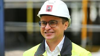 Укладка асфальта завершена в проблемном ЖК «Троицкая ривьера»